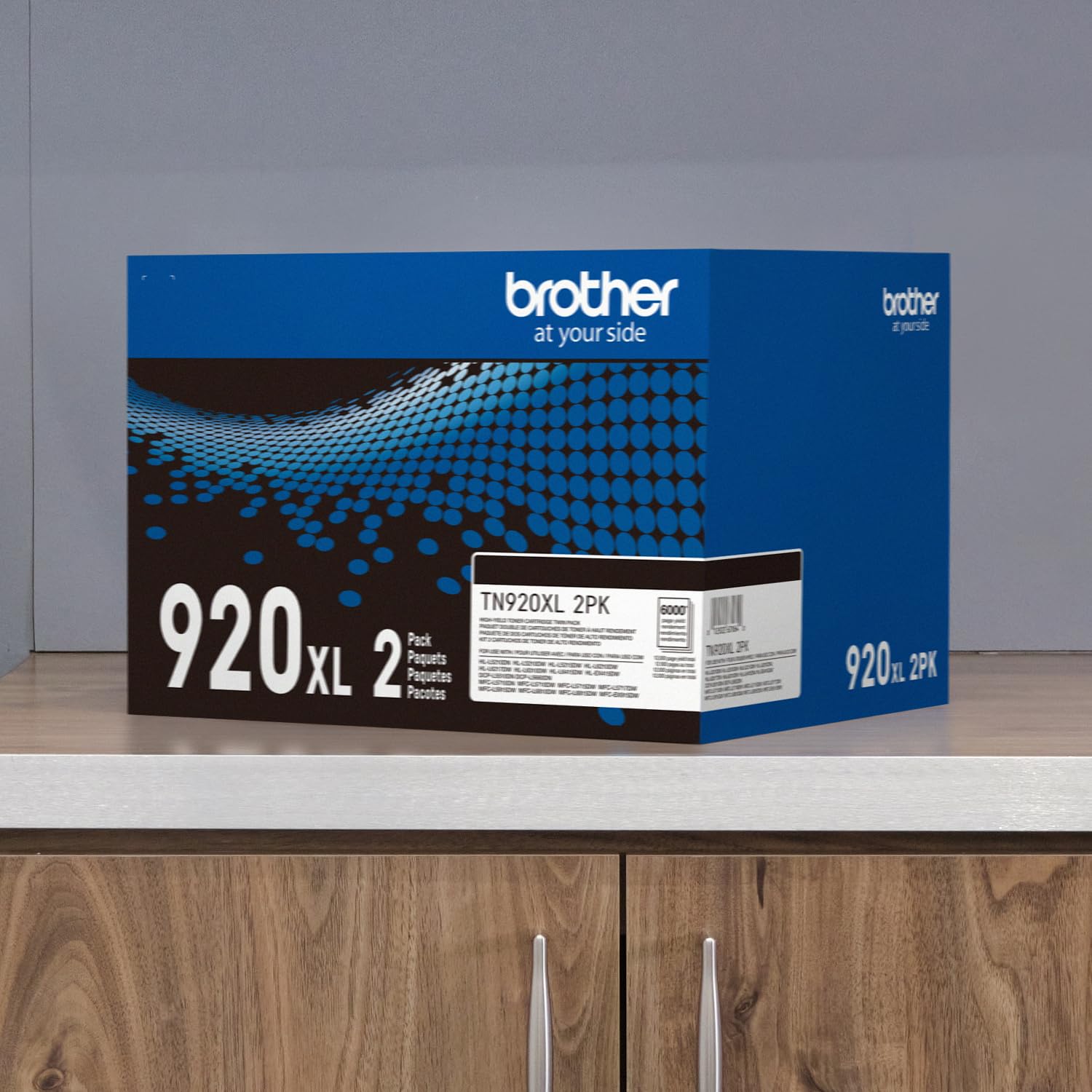 Brother TN920XL next to ruler to show cartridge scale and fitment