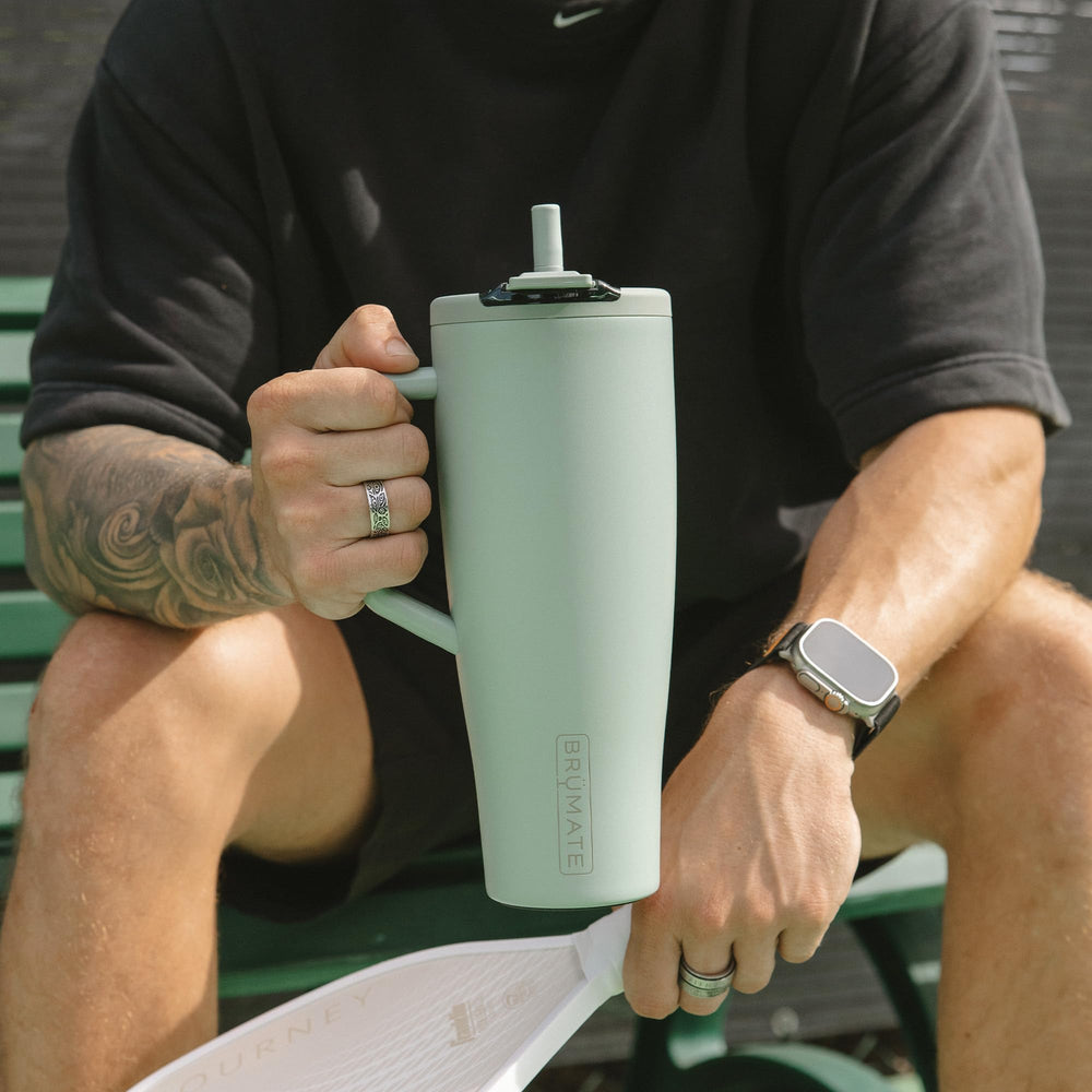 BrüMate Era Flip disassembled lid parts showing removable pieces for deep cleaning