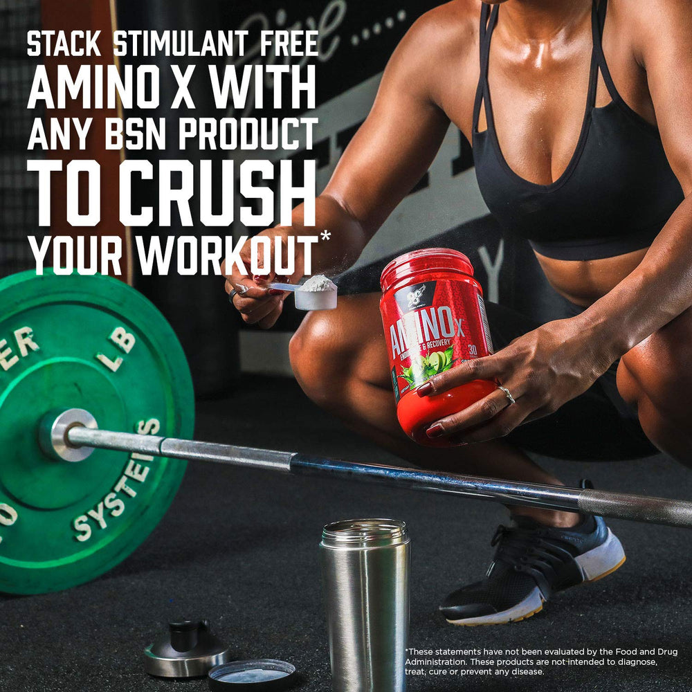 BSN pouring grape AMINOx powder to show micronized texture and no clumps