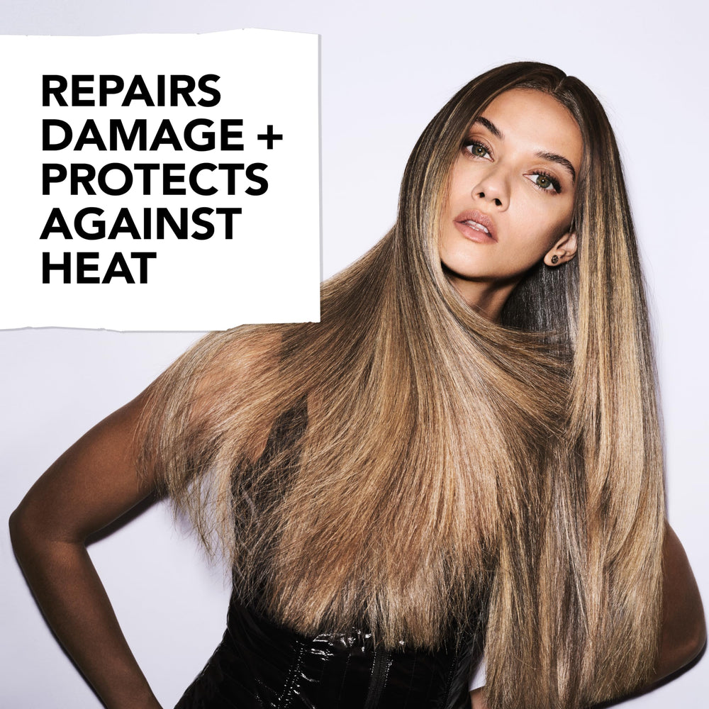 Bumble and bumble mist spraying to protect hair during styling