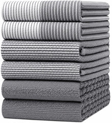 Bumble Towels front packaging showing six grey cotton towels and gift tote, convenient storage