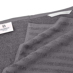 Bumble Towels in use drying glassware on a kitchen counter for streak-free shine