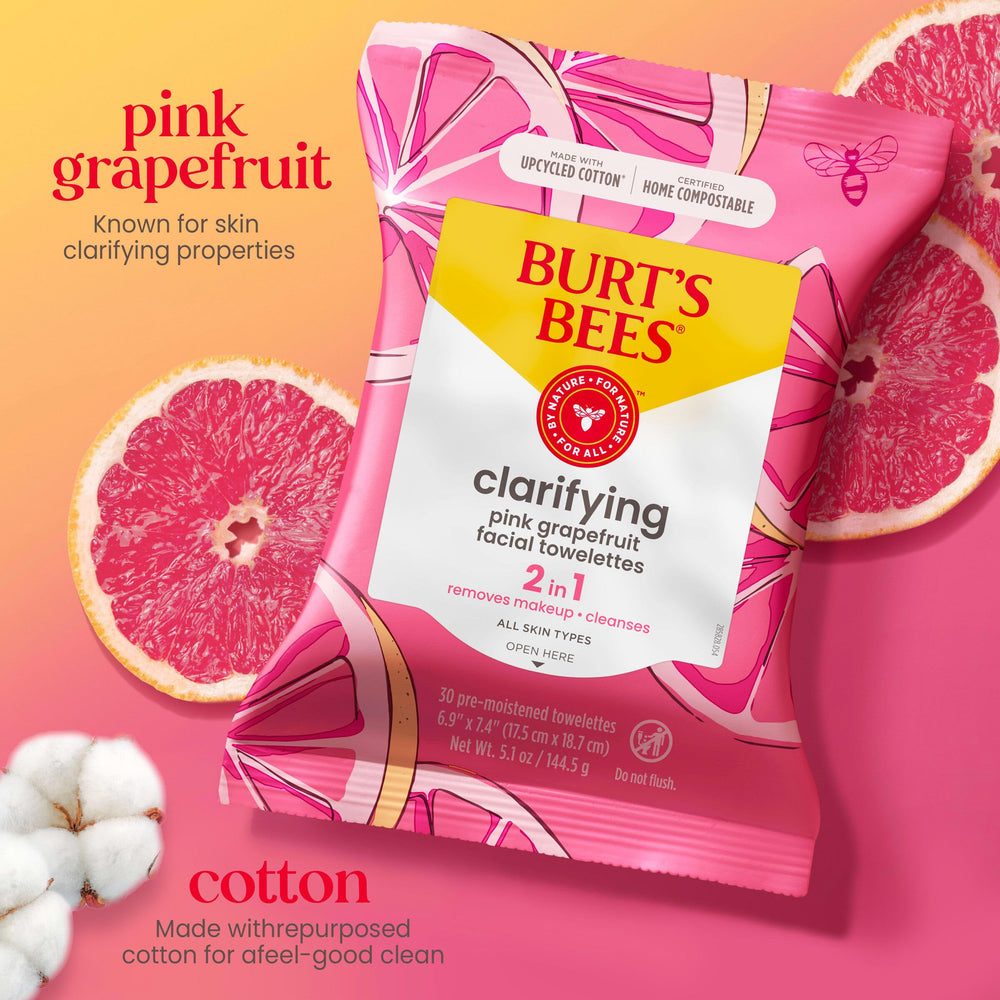 Hand using Burt's Bees wipe removing makeup for quick convenience