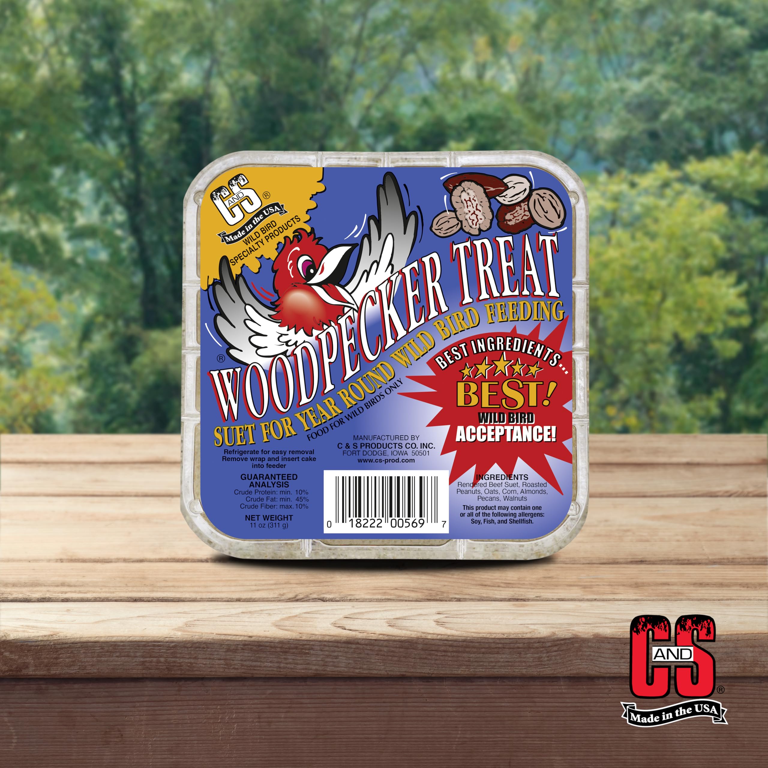 C&S suet feeder in seasonal backyard scene encouraging wildlife visits year-round