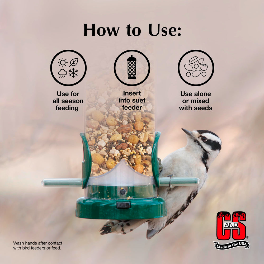 A woodpecker eating C&S nuggets showing attraction and natural feeding behavior