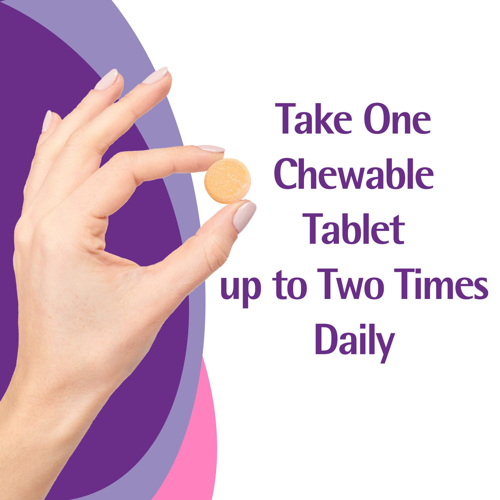 Hand holding a Caltrate chewable tablet to show suggested serving size