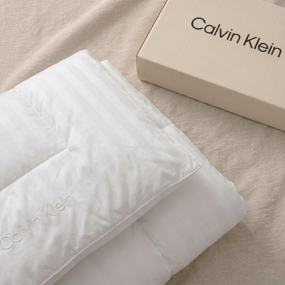 Calvin Klein label and care tag showing washing instructions and easy-care benefit