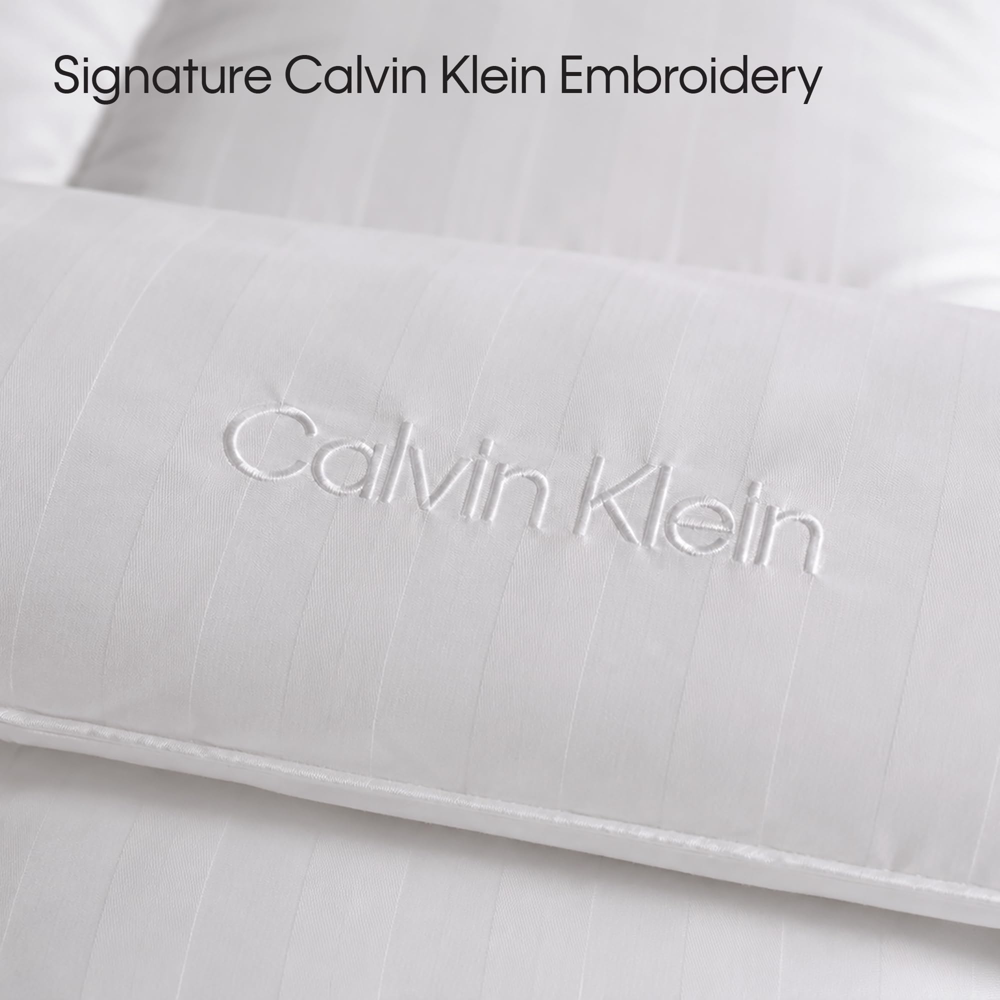 Calvin Klein measuring tape beside comforter showing accurate size and proper fit benefit