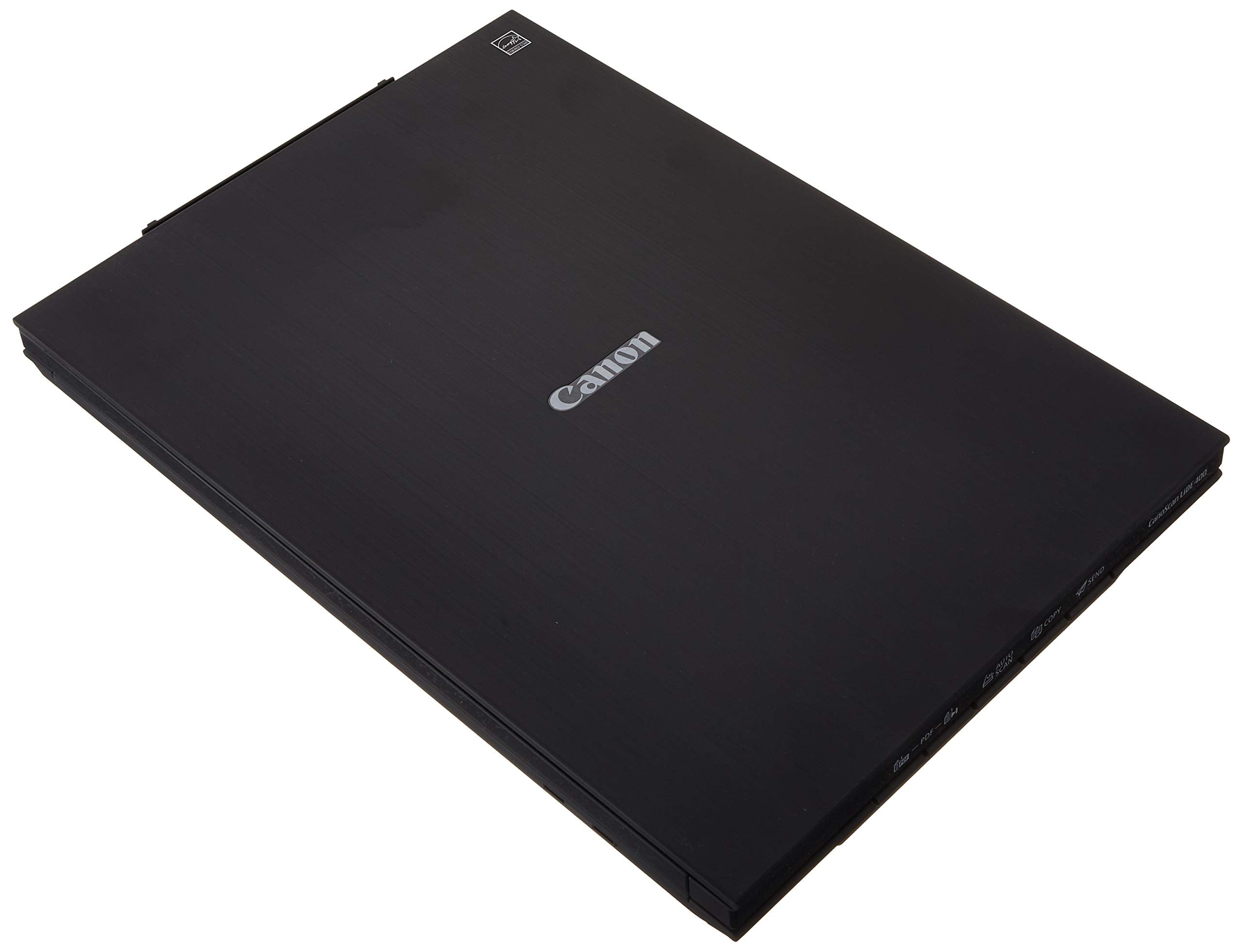 Canon CanoScan LiDE 400 on a home office desk scanning a photo, improving workflow efficiency