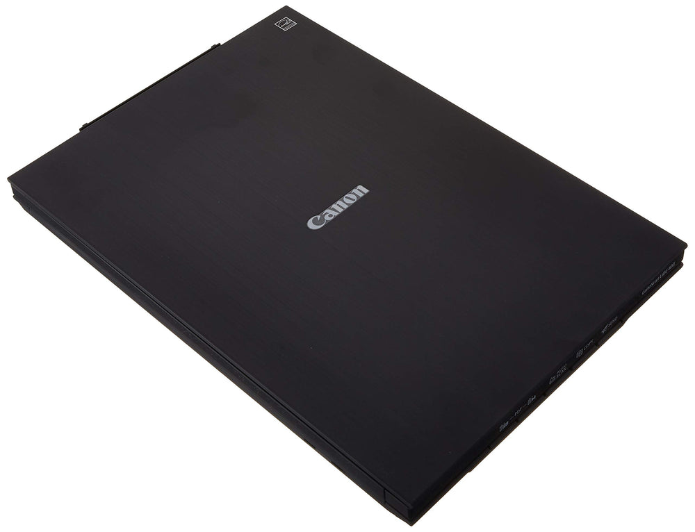 Canon CanoScan LiDE 400 on a home office desk scanning a photo, improving workflow efficiency