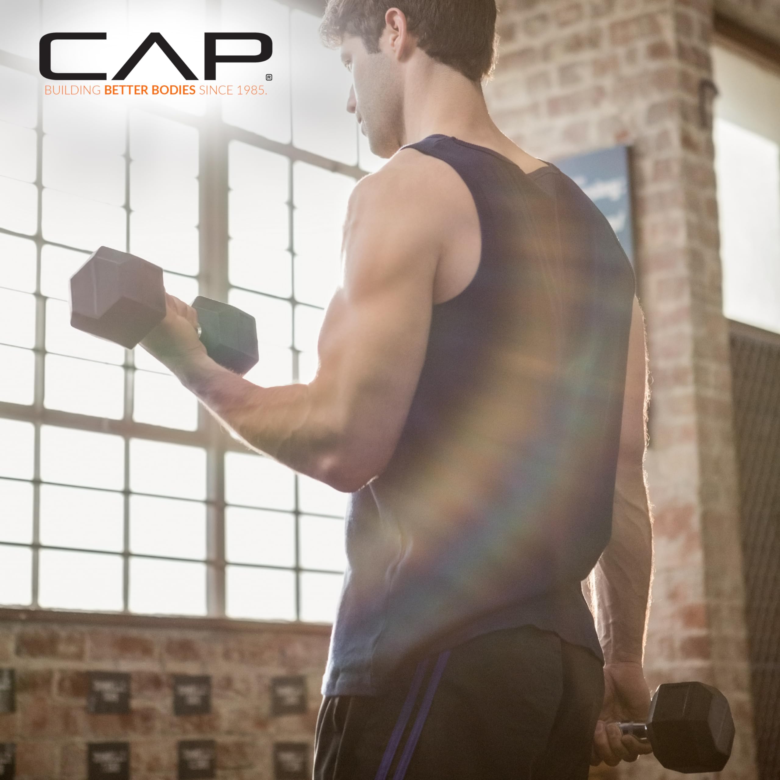 CAP hex dumbbell stable during plank showing anti-roll design benefit