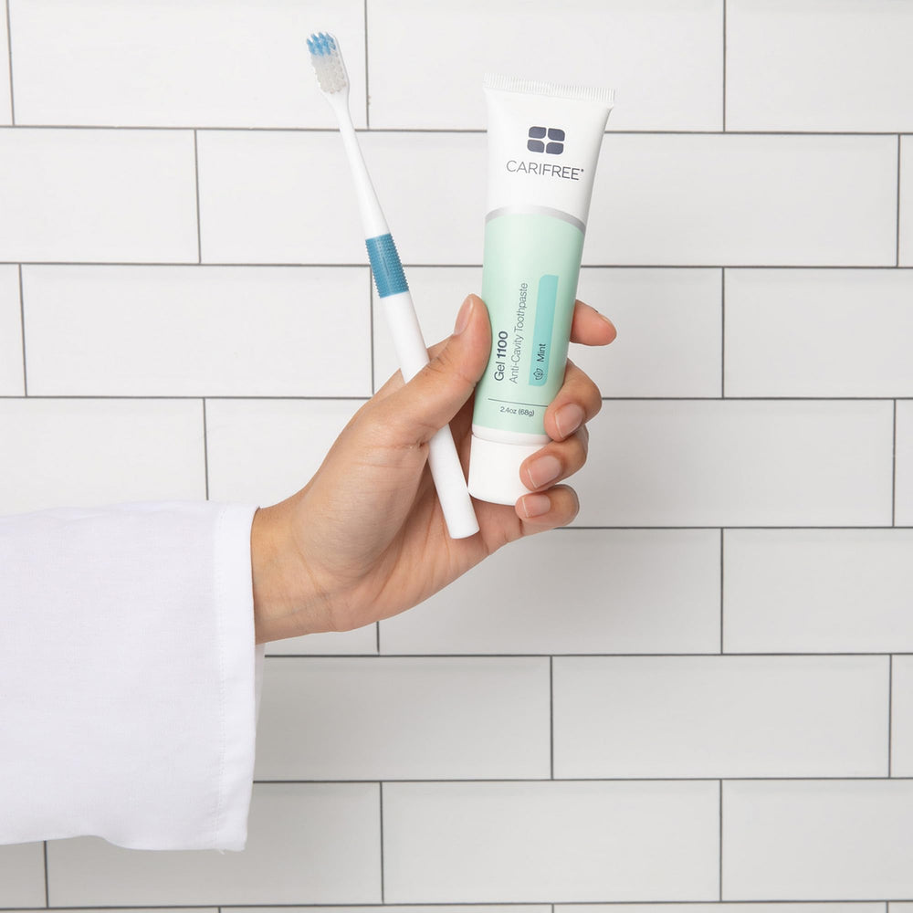 CariFree tube on bathroom shelf styled to show daily routine benefit