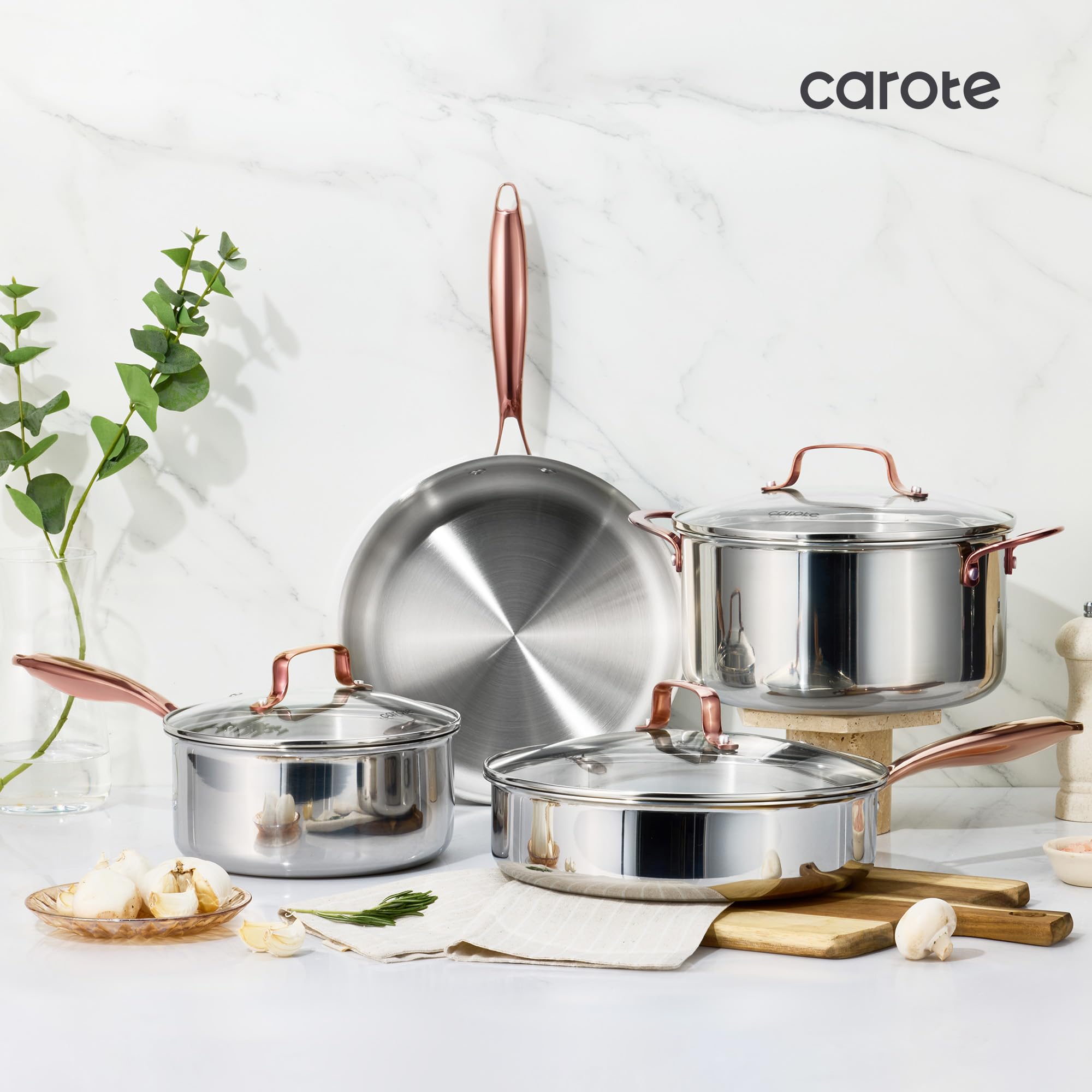 CAROTE pan next to wooden spoon showing size and kitchen-scale comparison