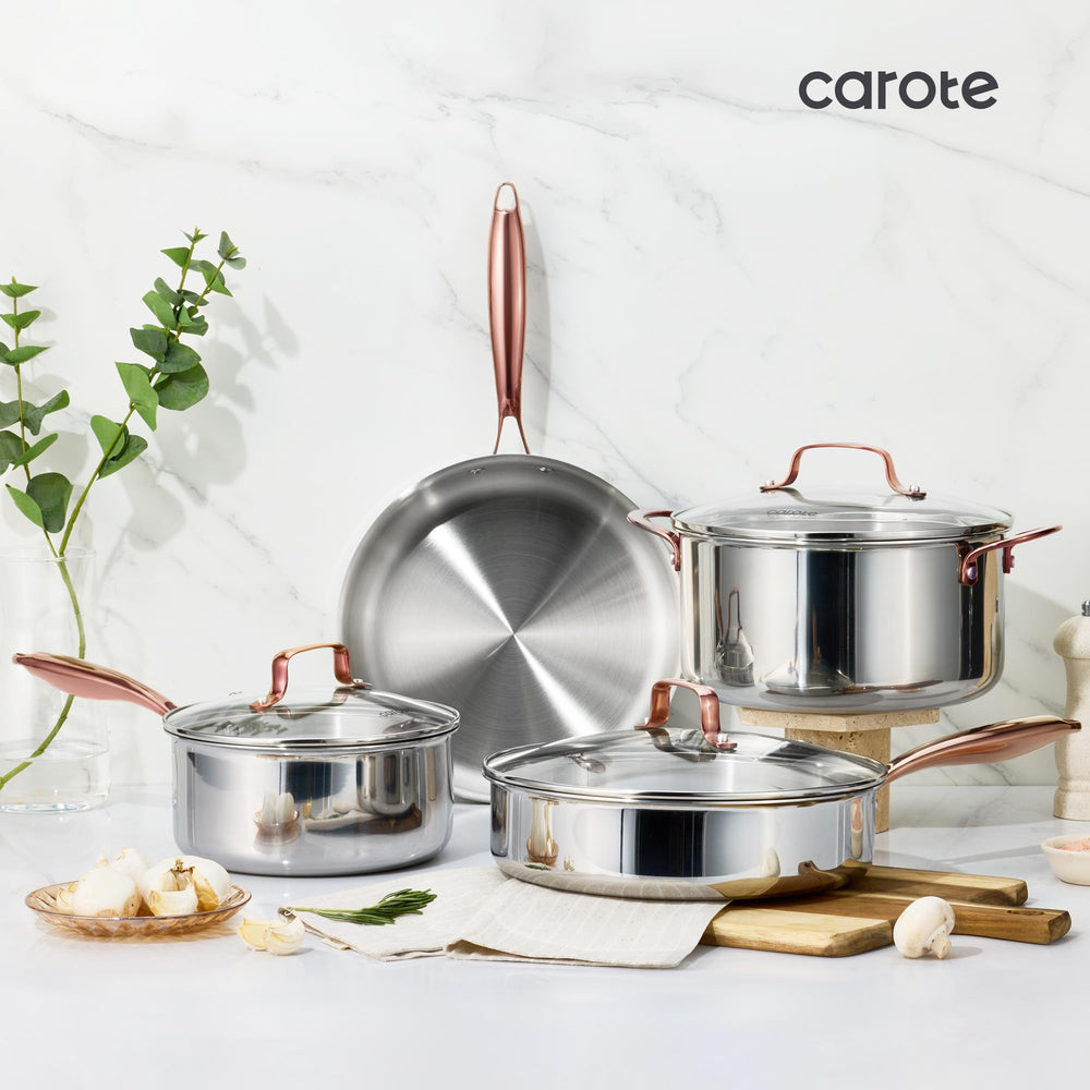 CAROTE pan next to wooden spoon showing size and kitchen-scale comparison
