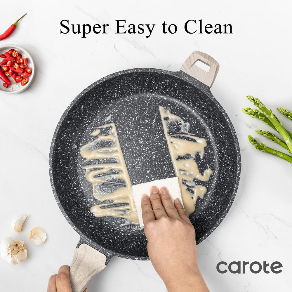 CAROTE pan next to spatula for scale showing large 12.5-inch capacity for family meals