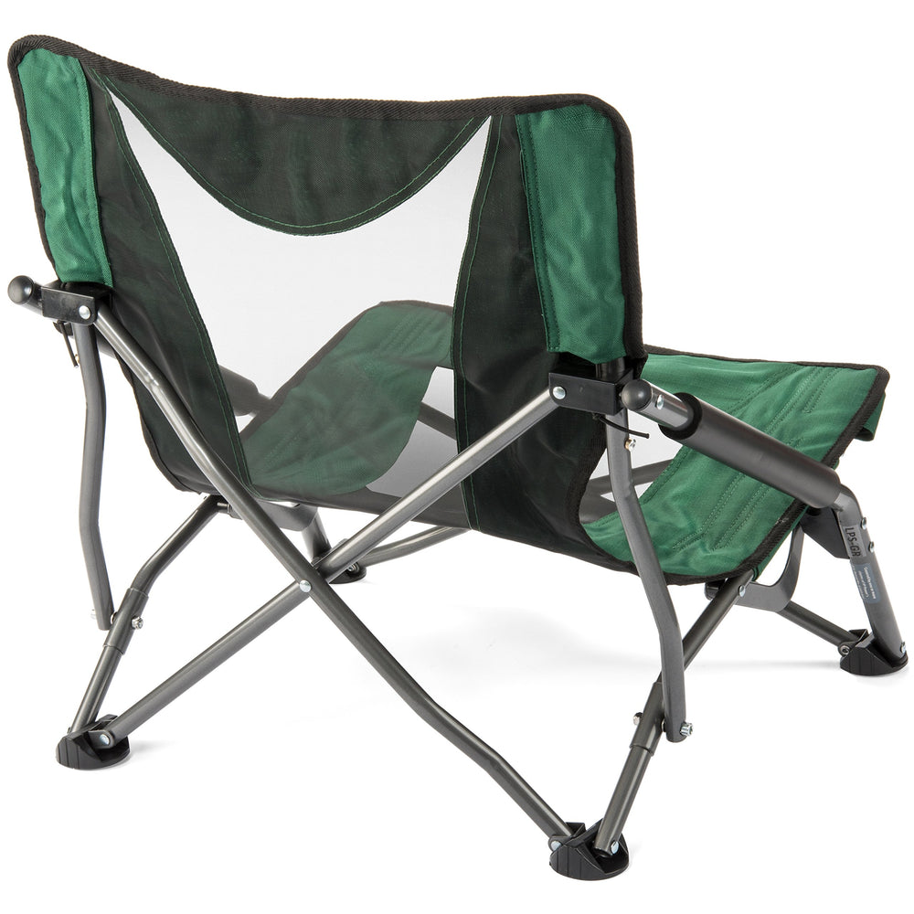 Cascade Mountain Tech near campfire illustrating low-profile relaxation and warmth