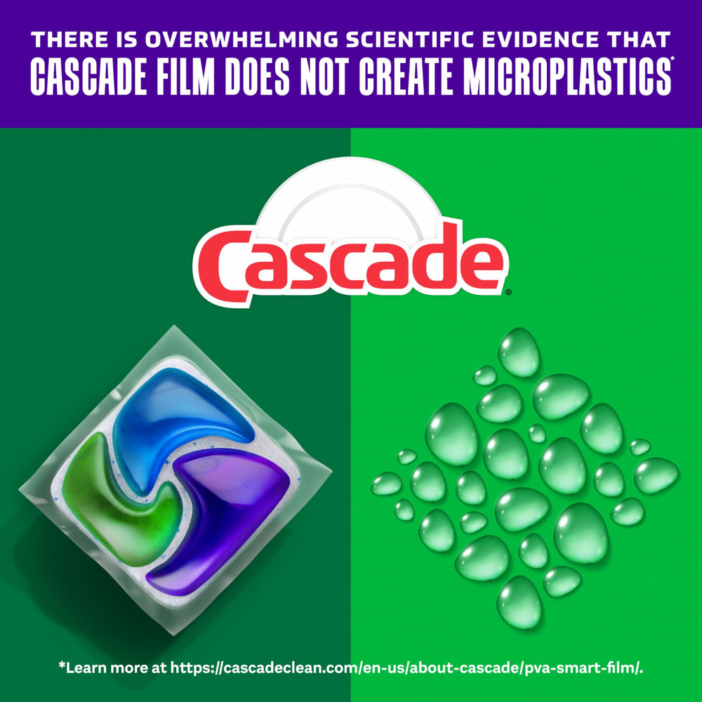 Dishwasher interior mid-cycle with Cascade action showing active cleaning and rinse action