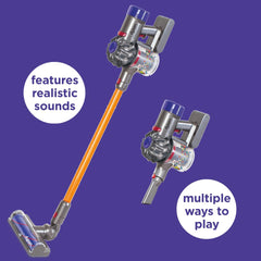 Casdon child using toy vacuum demonstrating independent role-play and motor skill practice