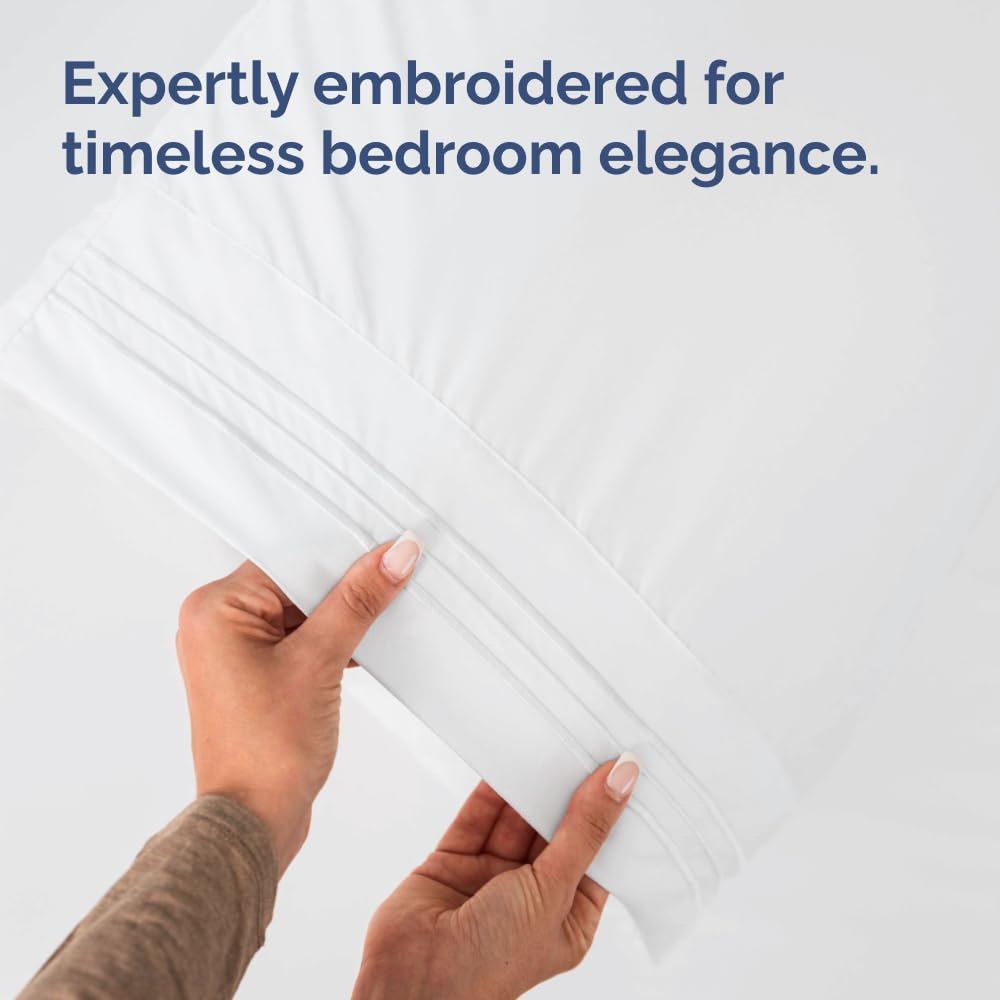 CGK Unlimited pillowcase on made bed lifestyle scene demonstrating cozy bedroom appeal