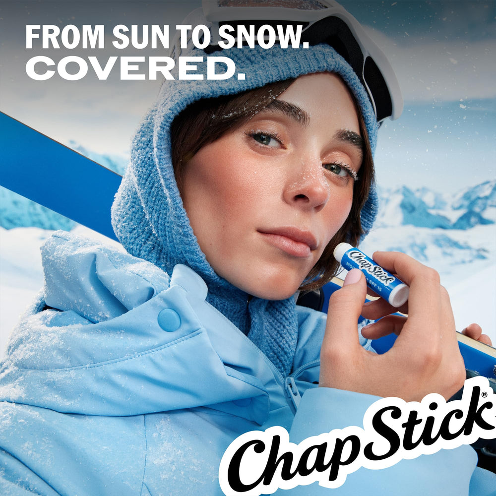 ChapStick among travel essentials demonstrating convenience for trips and outings