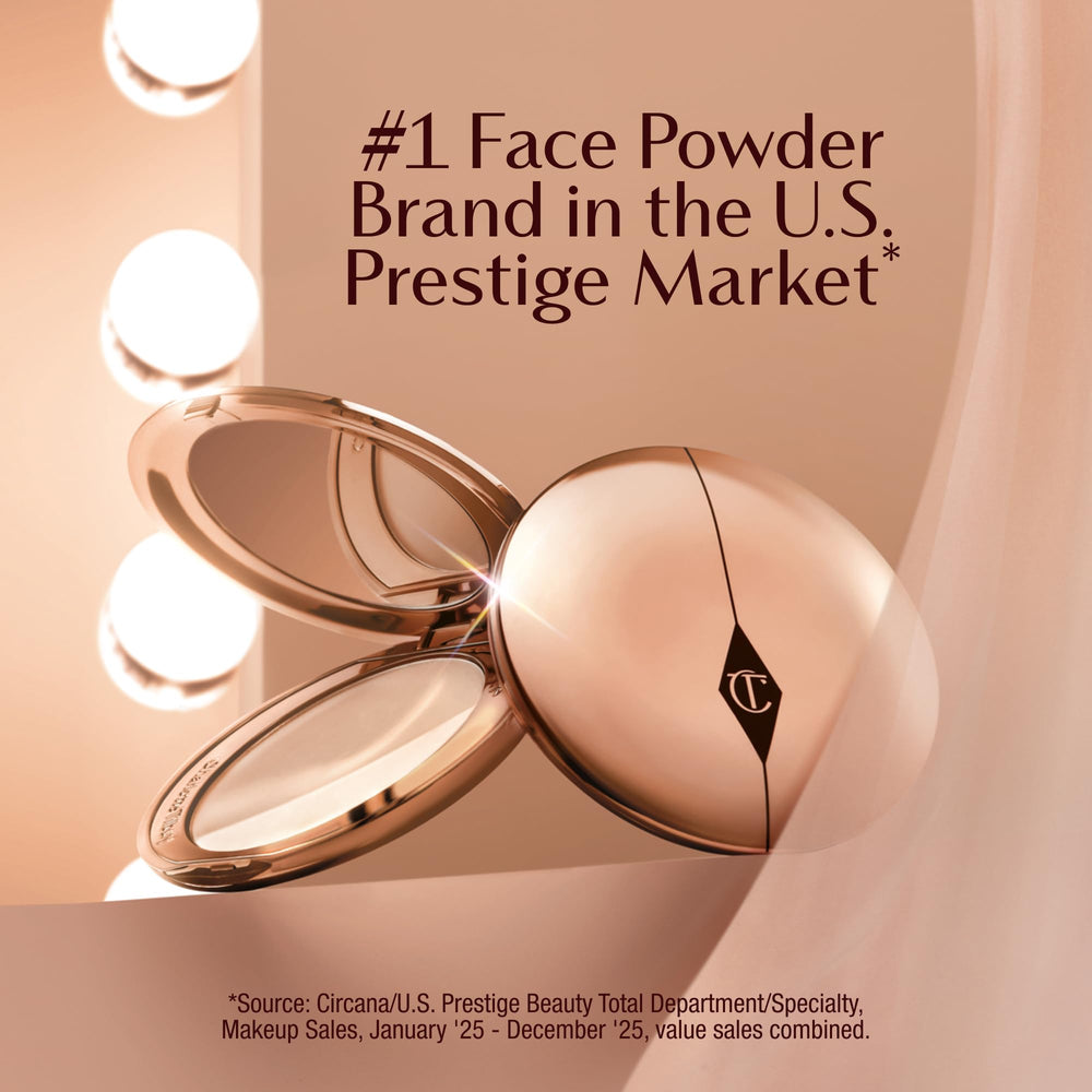 Charlotte Tilbury applying with powder brush for seamless mattifying and pore-blurring benefits