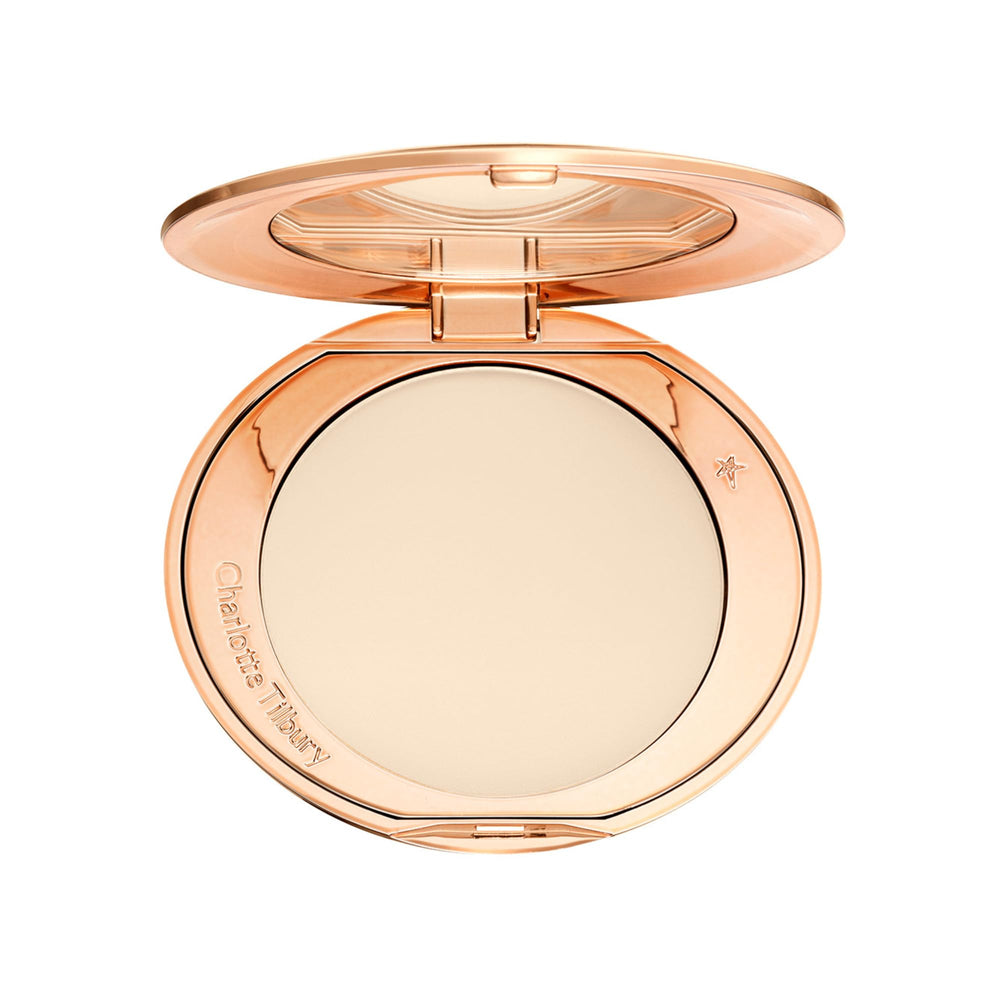 Charlotte Tilbury compact front packaging showing sleek design and travel convenience