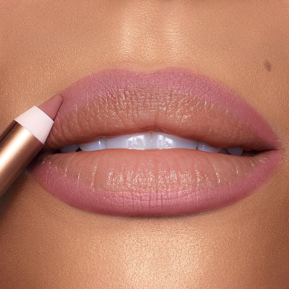 Charlotte Tilbury liner held in hand showing size and easy portability benefit