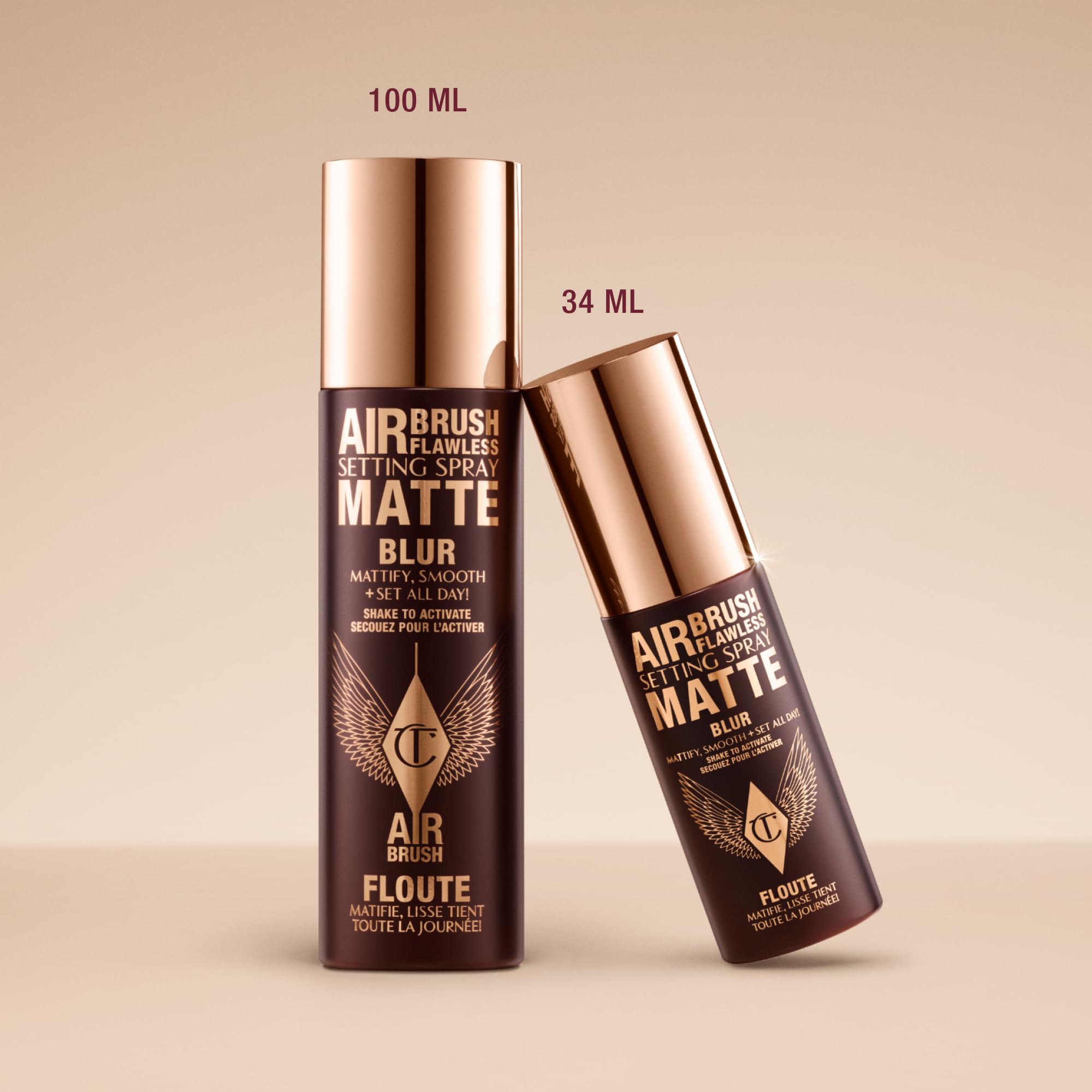 Charlotte Tilbury refresh makeup midday as model mists face to revive and seal makeup