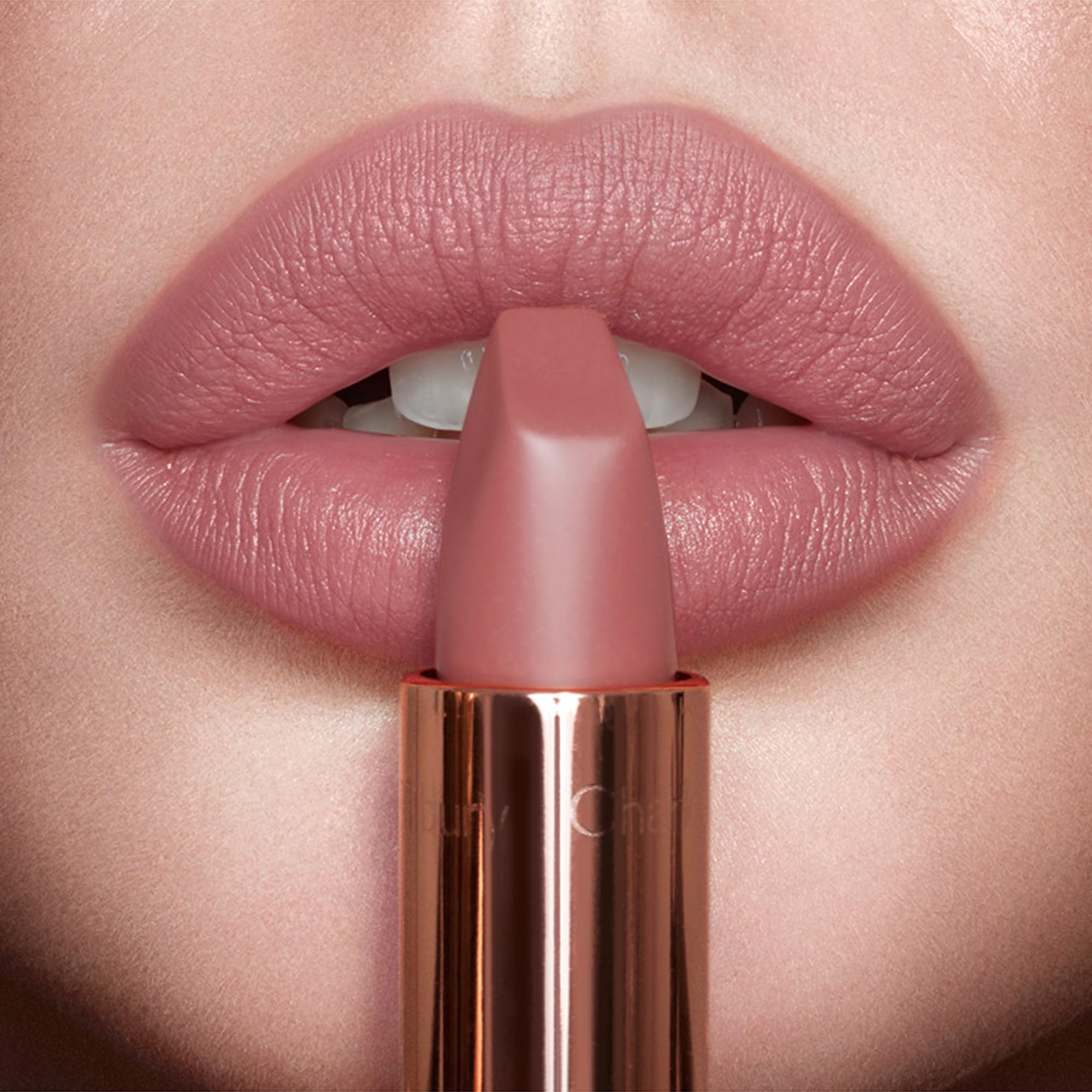 Charlotte Tilbury creamy texture swatch on skin demonstrating smooth glide
