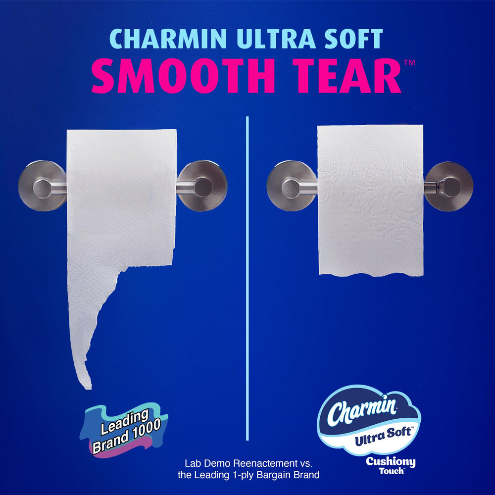 Charmin roll next to a ruler for size and sheet-count comparison