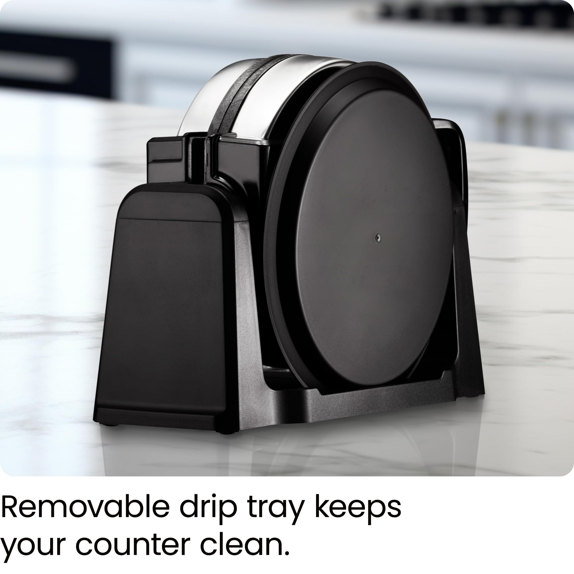 Chefman next to a hand to illustrate compact size and real-world scale for small kitchens