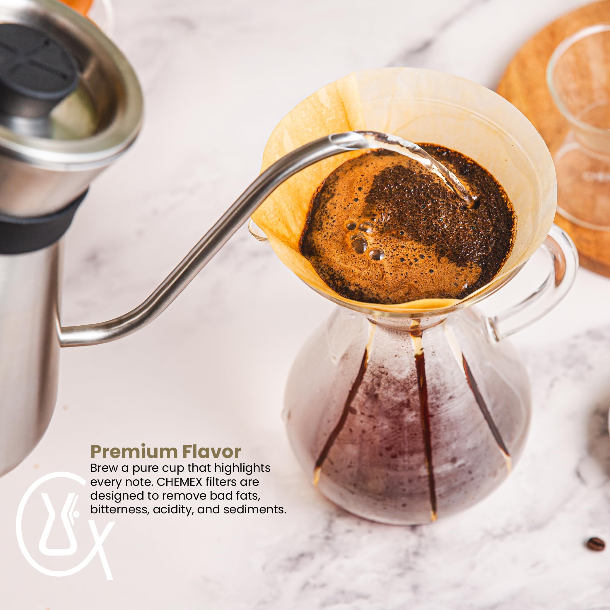 Chemex filter brewing with kettle pour showing steady flow and controlled extraction
