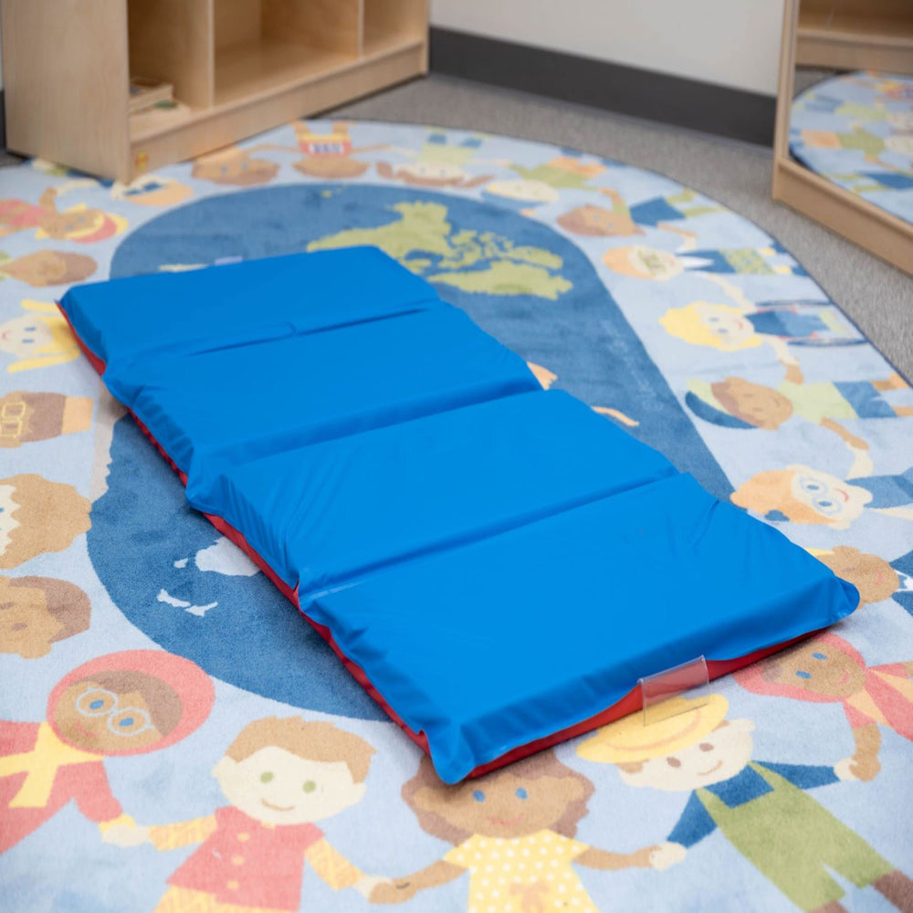 Children's Factory packaged mat label showing product info and classroom-grade warranty benefit