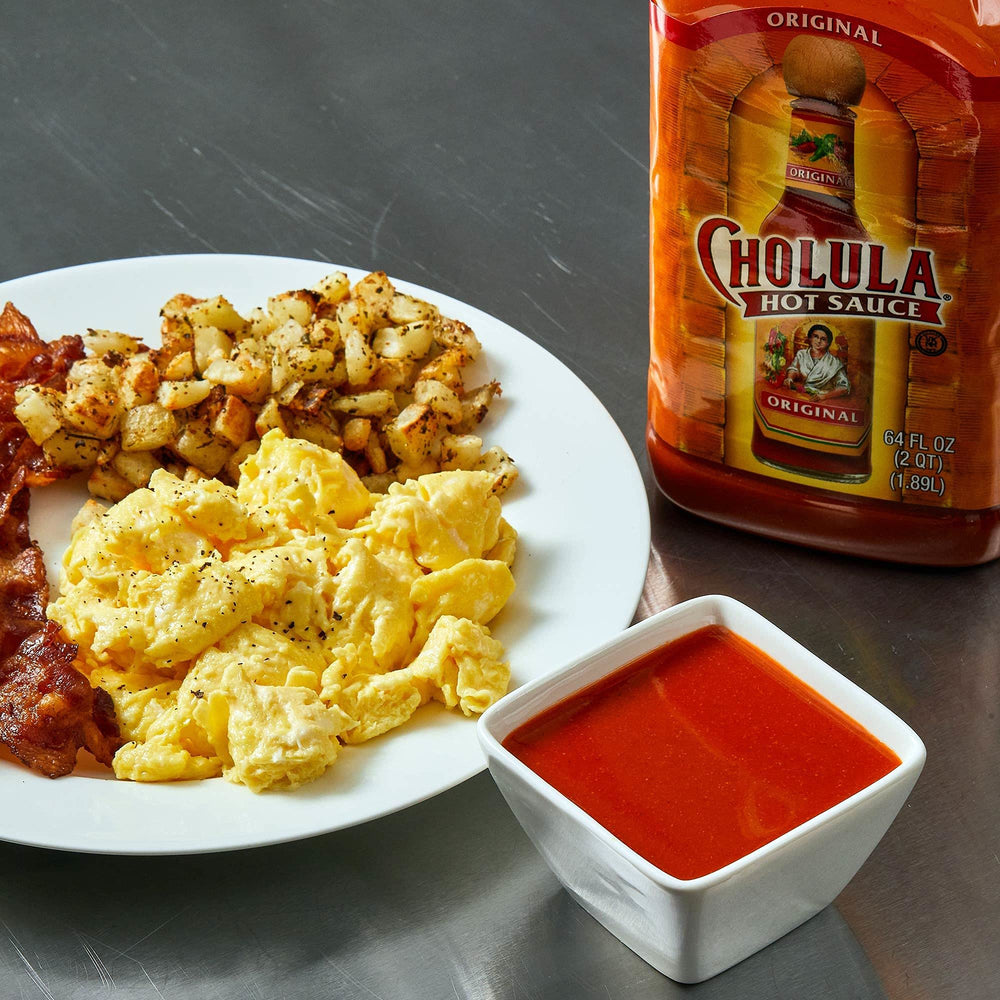 Cholula placed on a dining table ready for guests offering customizable heat at meals