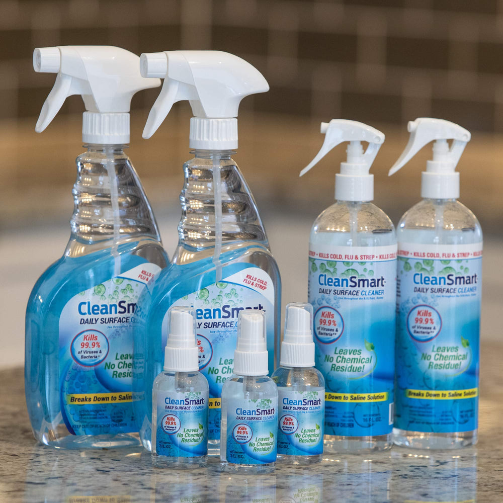 CleanSmart held in hand for scale showing compact bottle size and easy handling
