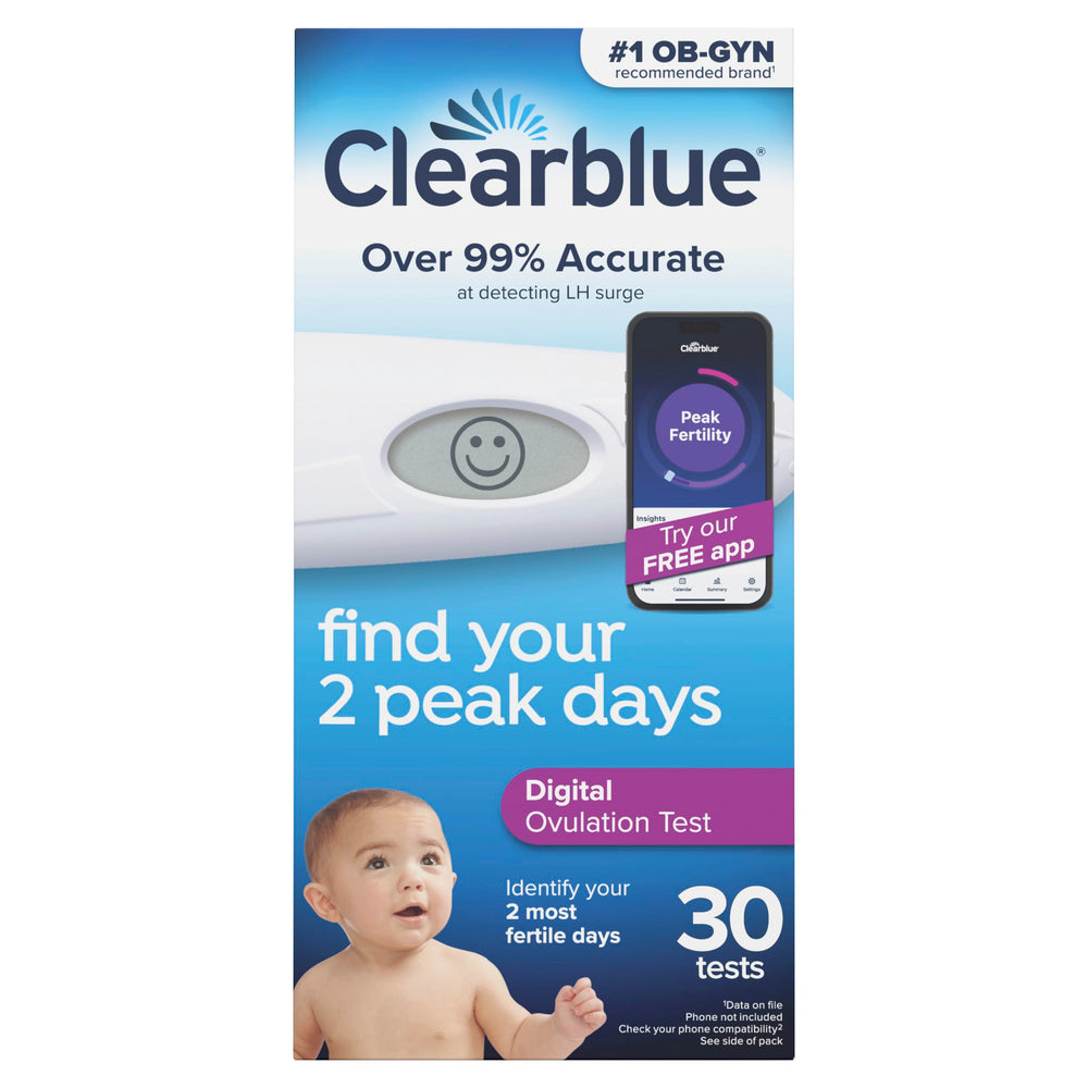 Clearblue digital reader display with smiley result indicating peak fertility