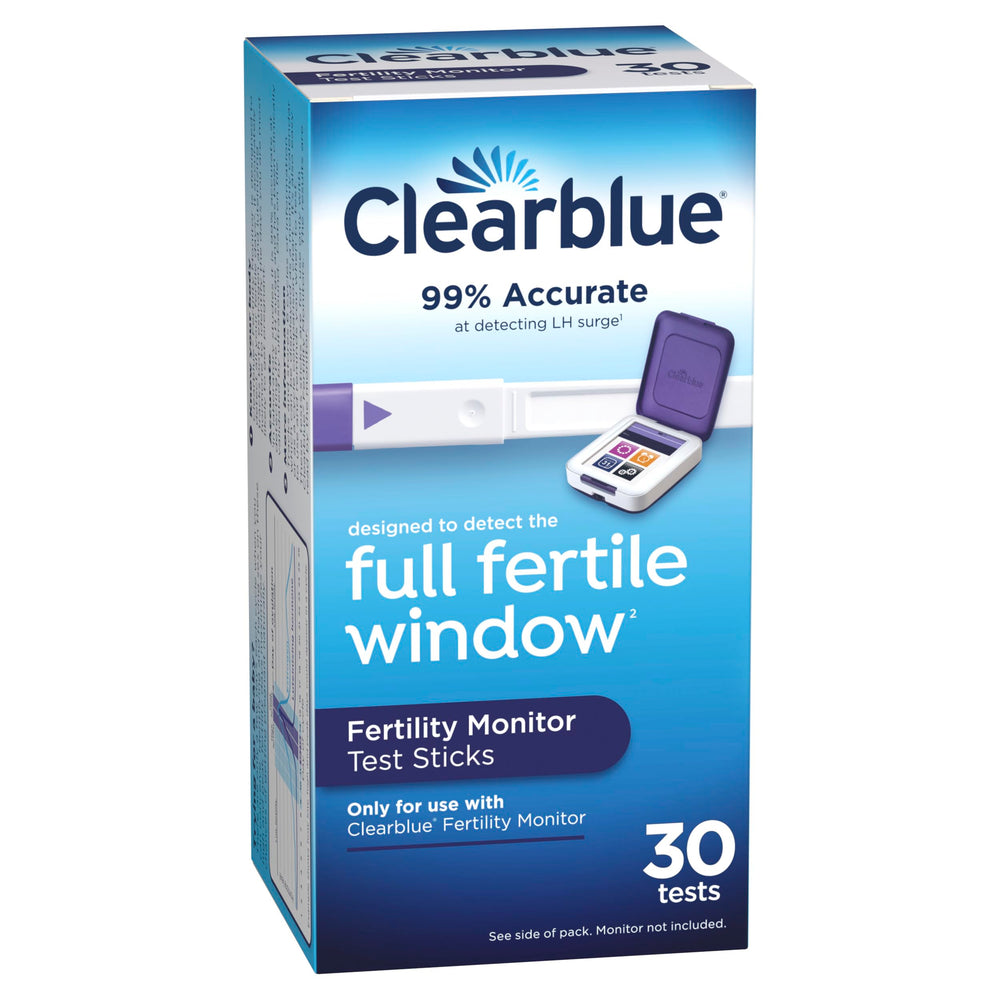 Couple in bedroom with Clearblue monitor suggesting planned timing