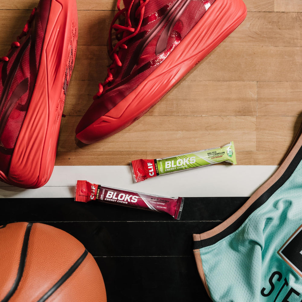 Clif Bloks single pack stashed in a running vest pocket for convenient on-trail fueling