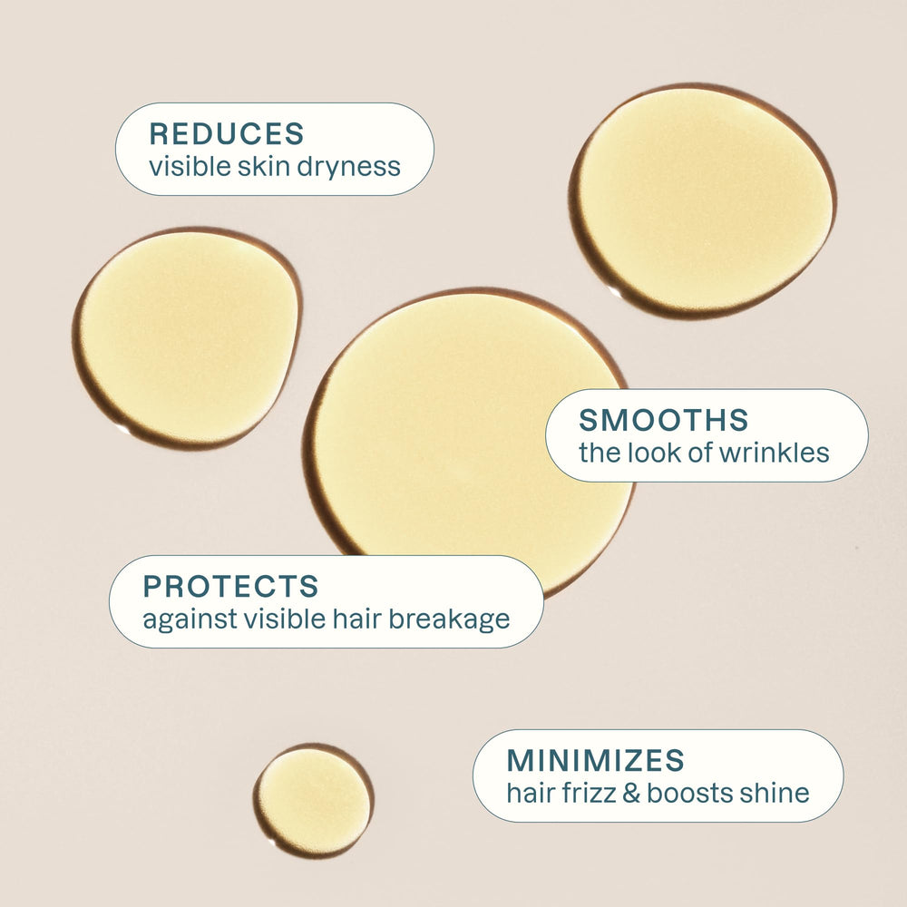 Cliganic jojoba oil applied on hands for fast skin hydration