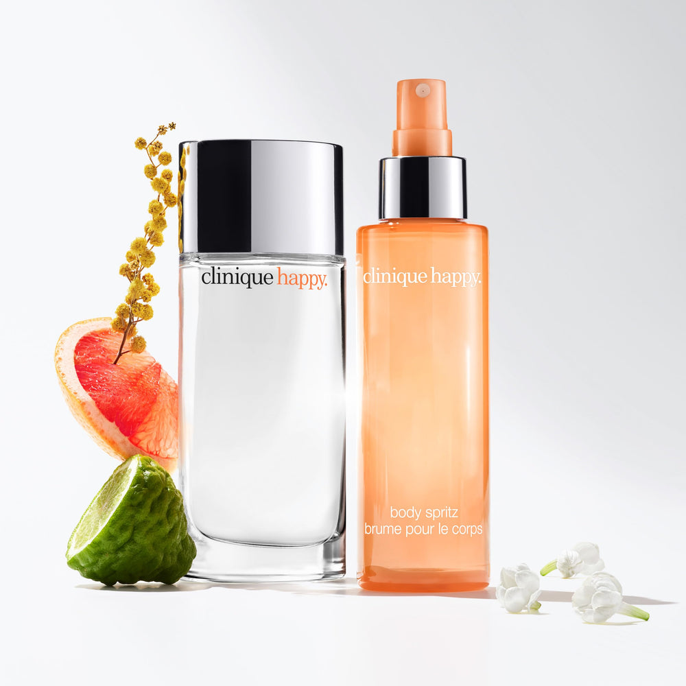 Clinique Happy Body Spritz outdoors in sunlight illustrating uplifting daytime wear