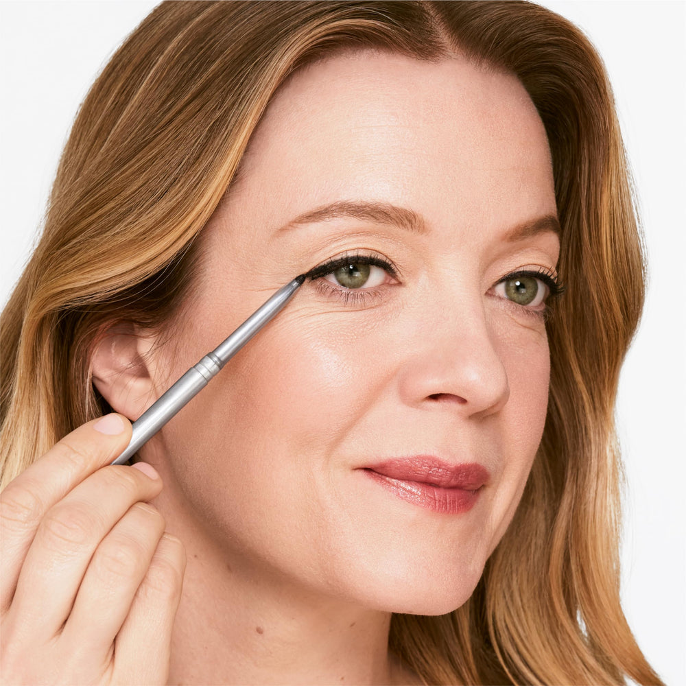 Clinique Quickliner texture swatch on skin showing smooth pigment payoff benefit