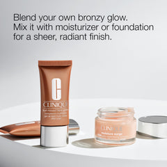Clinique bottle held in hand for size and scale, travel-friendly benefit
