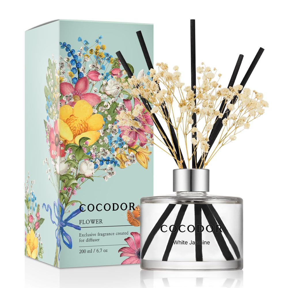 Cocod'or front bottle showing white jasmine diffuser and decorative flower for elegant display