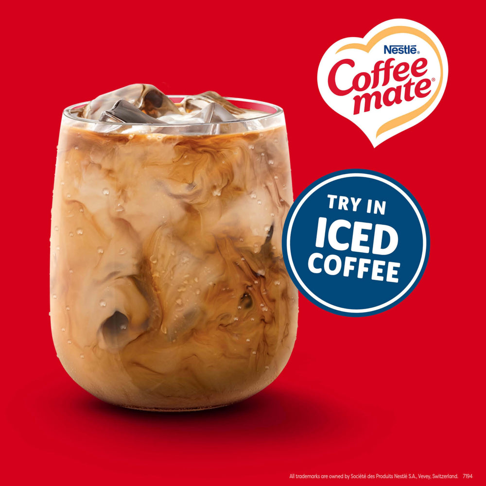 Coffee mate creamer poured into coffee showing rich swirl and better flavor