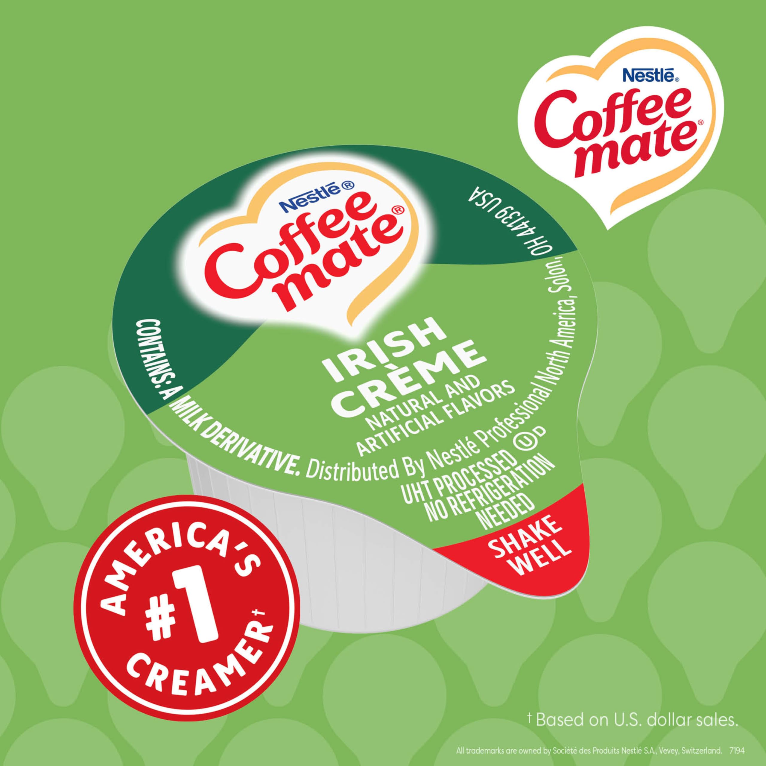 Coffee mate tubs arranged on a break room counter for guest-ready service