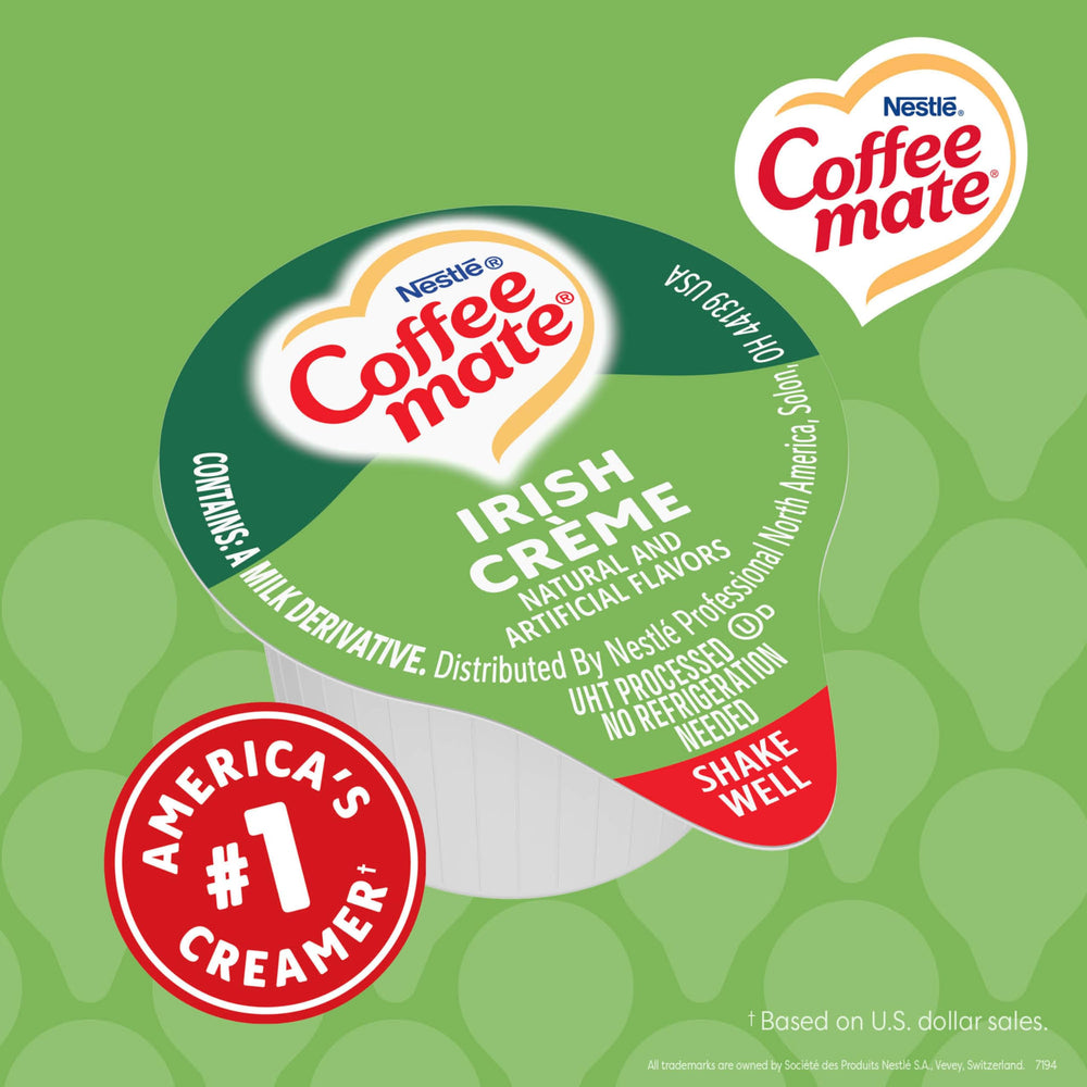 Coffee mate tubs arranged on a break room counter for guest-ready service
