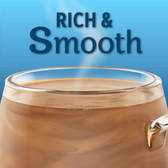 Coffee mate spoonful of creamer being added to coffee for fast blending