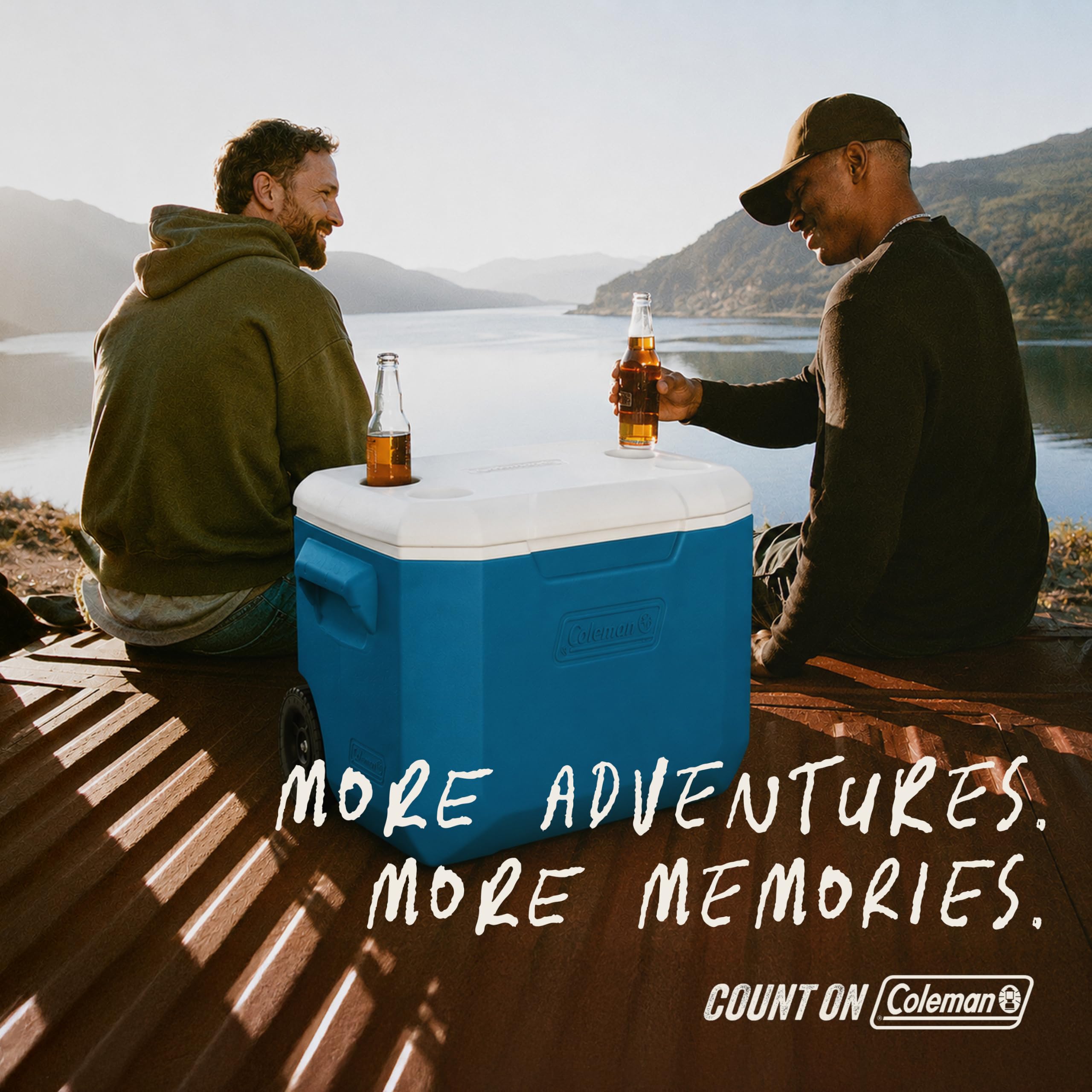 Coleman cooler next to person to show size and scale for outdoor use