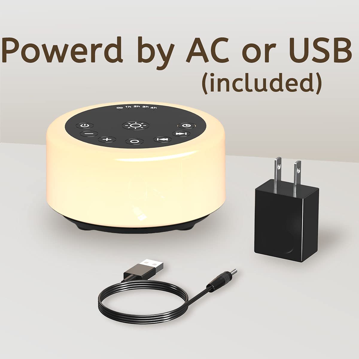 ColourNoise Soother next to a smartphone for scale showing compact portable size for travel