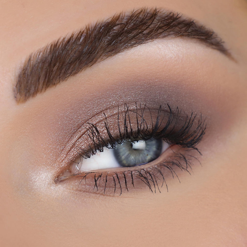 ColourPop metallic shade swatched on arm showing sparkle payoff and glow benefit